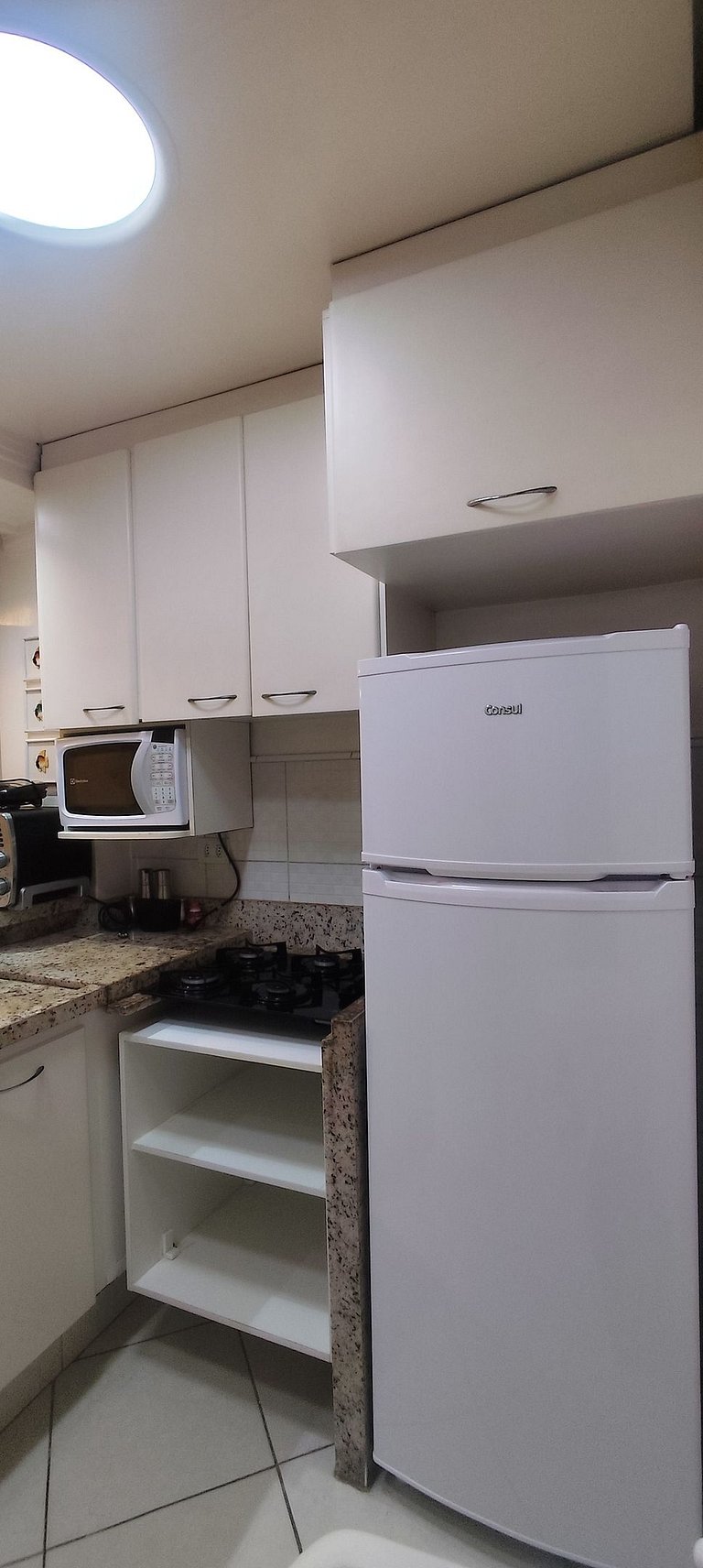 apartamento pé na areia da praia do tombo frente ao mar