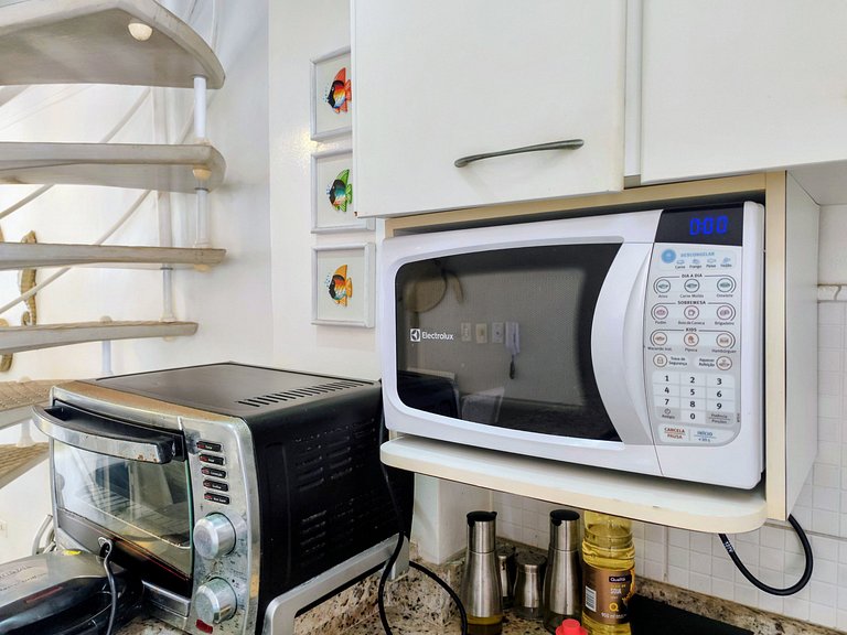 apartamento pé na areia da praia do tombo frente ao mar