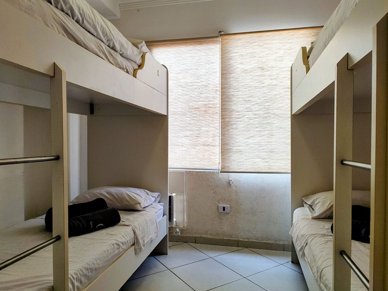 apartamento pé na areia da praia do tombo frente ao mar