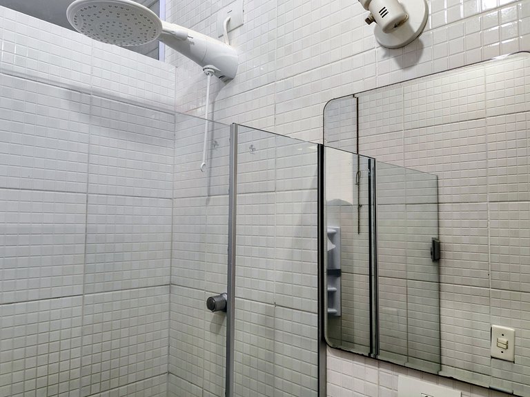 apartamento pé na areia da praia do tombo frente ao mar