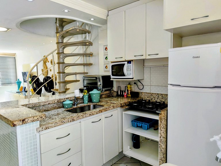 apartamento pé na areia da praia do tombo frente ao mar