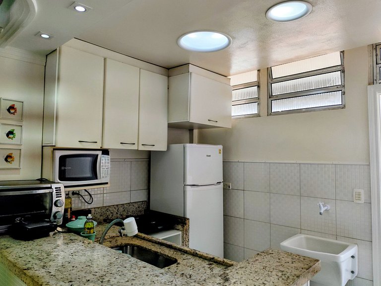 apartamento pé na areia da praia do tombo frente ao mar