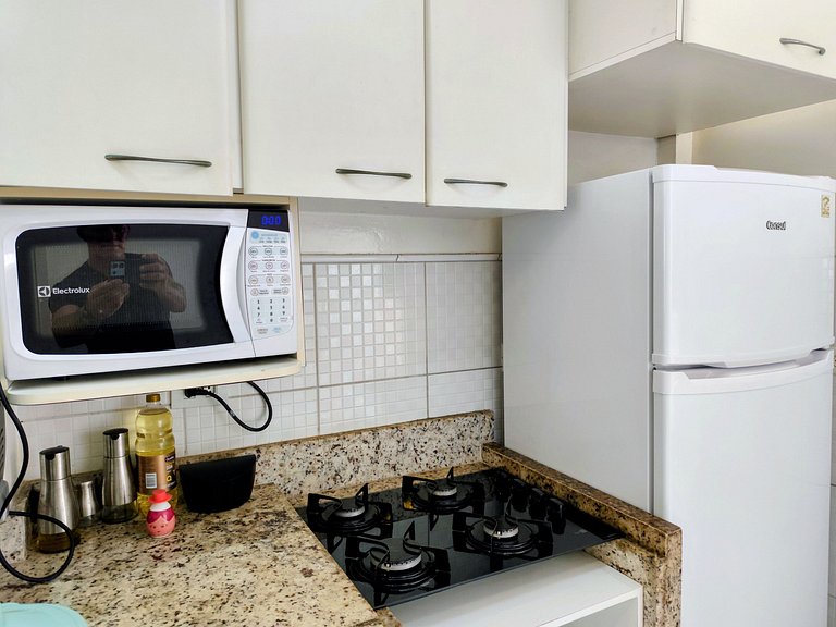 apartamento pé na areia da praia do tombo frente ao mar