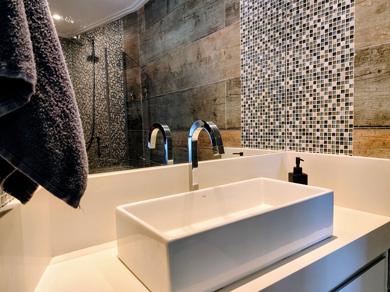 Apartamento pé na areia da praia do Tombo em Frente ao mar