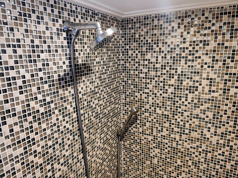 Apartamento pé na areia da praia do Tombo em Frente ao mar