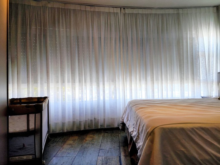 Apartamento pé na areia da praia do Tombo em Frente ao mar