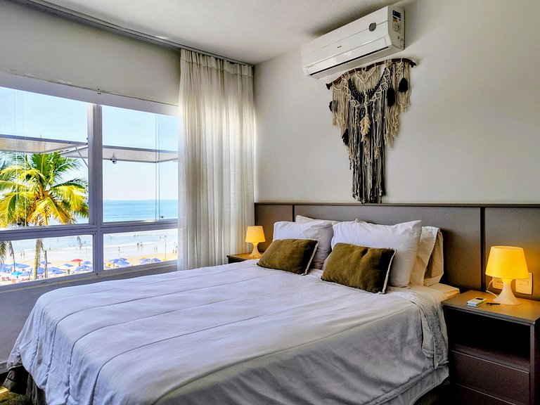 Apartamento pé na areia da praia do Tombo em Frente ao mar