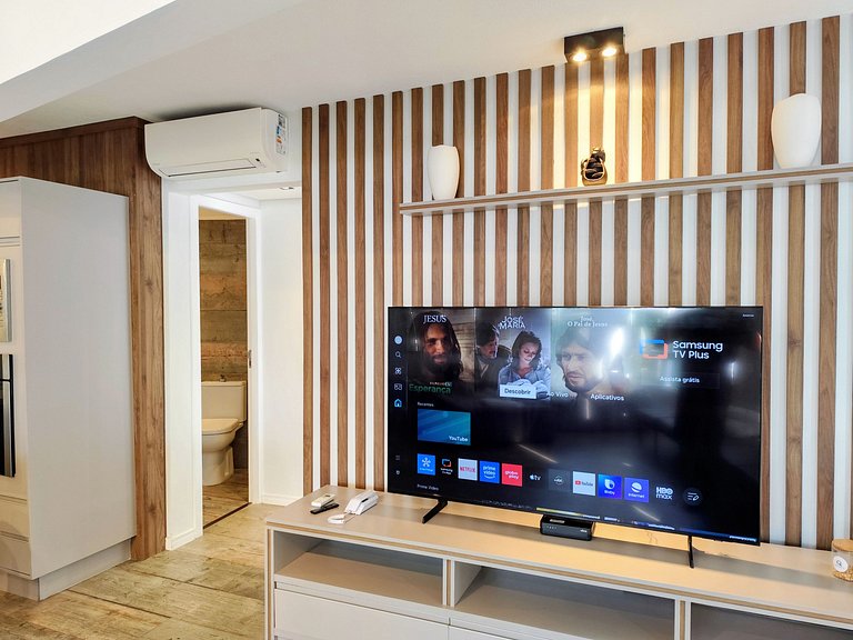 Apartamento pé na areia da praia do Tombo em Frente ao mar