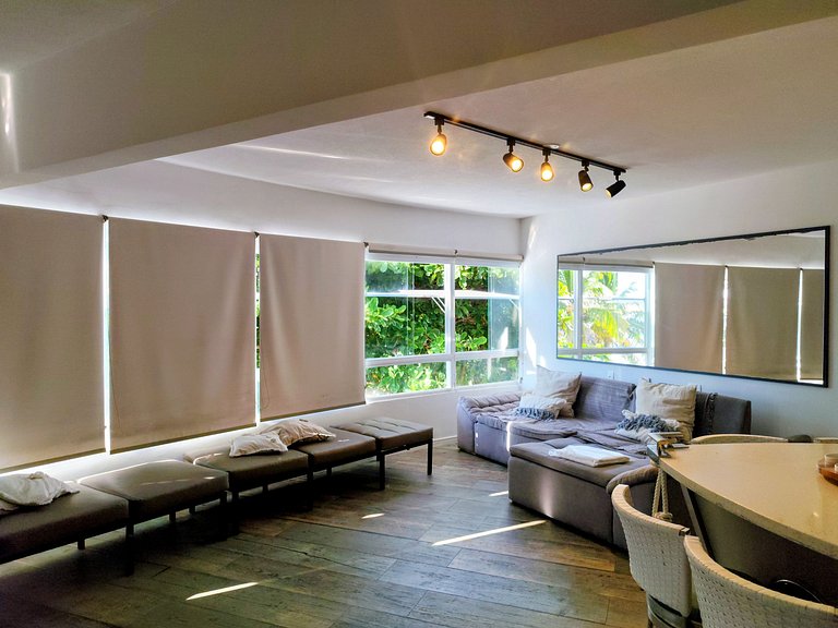 Apartamento pé na areia da praia do Tombo em Frente ao mar