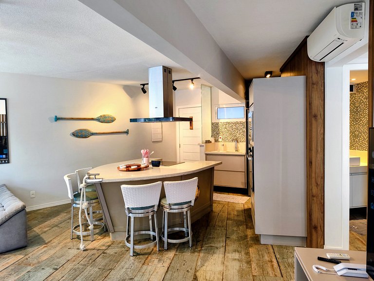 Apartamento pé na areia da praia do Tombo em Frente ao mar