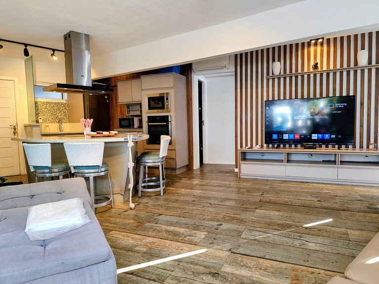 Apartamento pé na areia da praia do Tombo em Frente ao mar