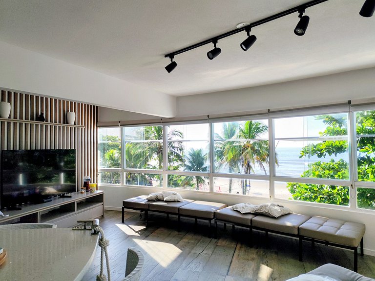 Apartamento pé na areia da praia do Tombo em Frente ao mar