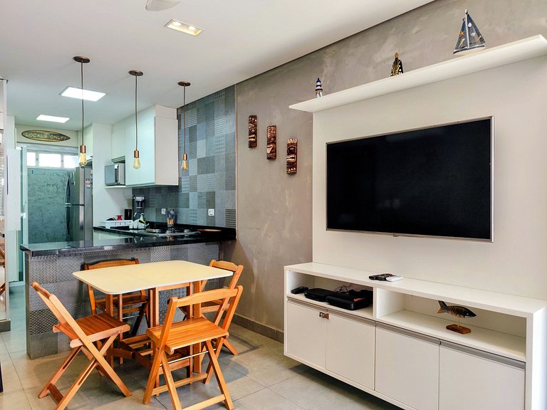 Apartamento pé na areia da praia do Tombo em Frente ao mar