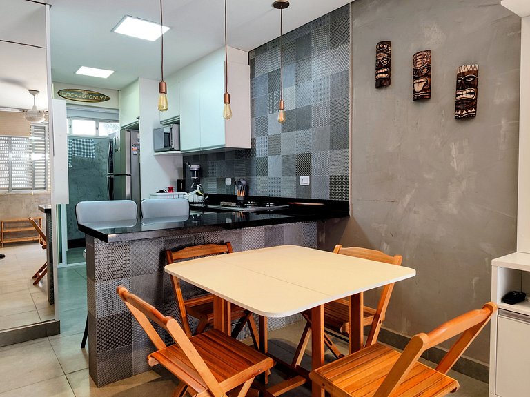 Apartamento pé na areia da praia do Tombo em Frente ao mar