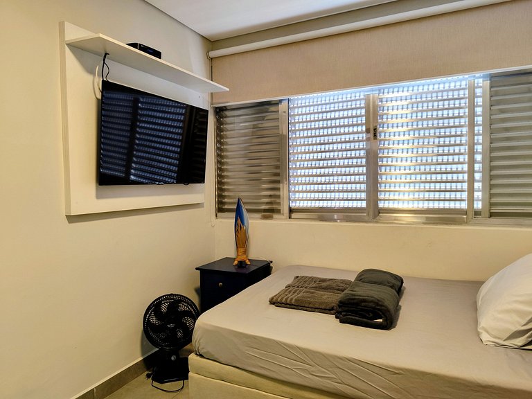 Apartamento pé na areia da praia do Tombo em Frente ao mar