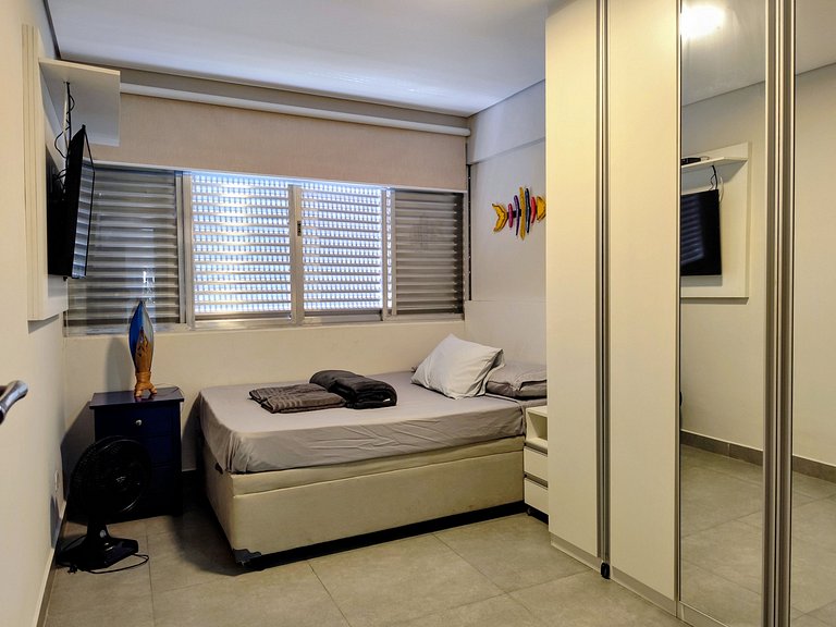 Apartamento pé na areia da praia do Tombo em Frente ao mar