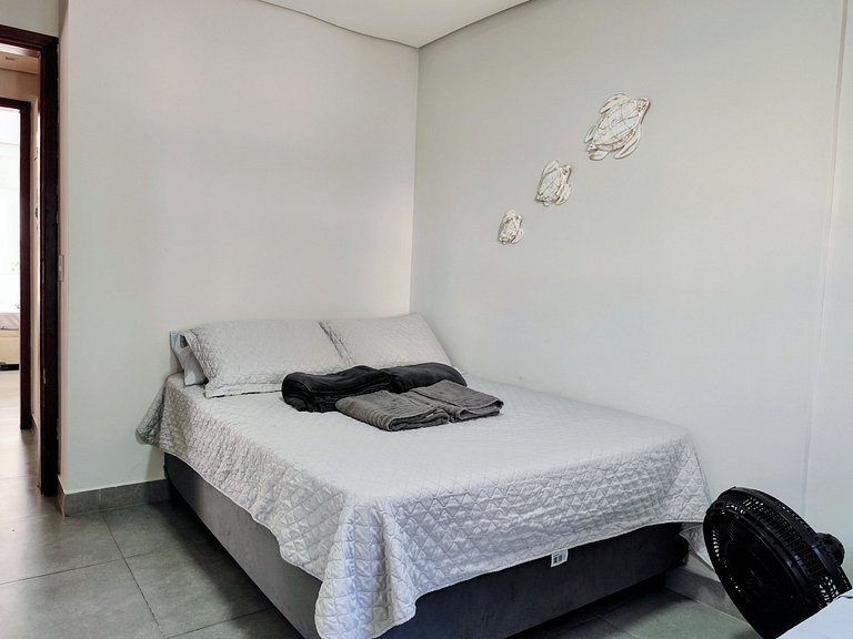 Apartamento pé na areia da praia do Tombo em Frente ao mar