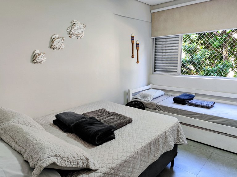 Apartamento pé na areia da praia do Tombo em Frente ao mar