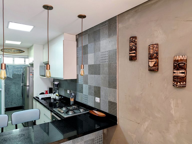 Apartamento pé na areia da praia do Tombo em Frente ao mar