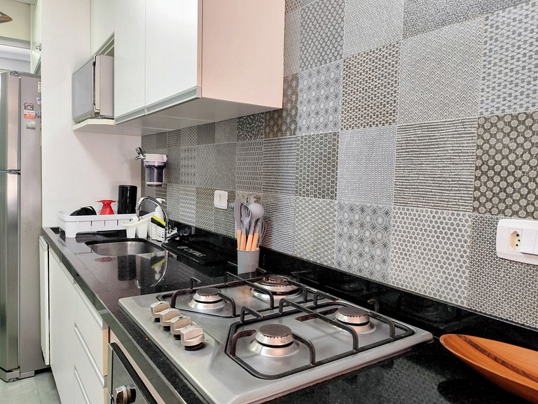 Apartamento pé na areia da praia do Tombo em Frente ao mar